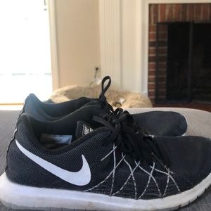 Nike fury 2 black womens sneakers size 7. Used